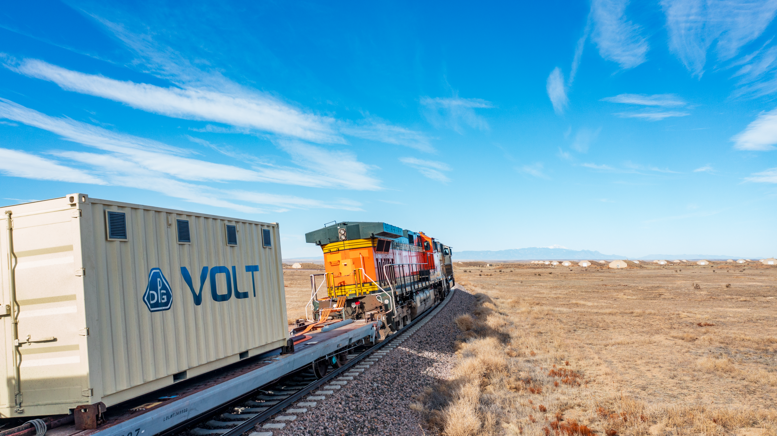 VOLT battery unit connected to locomotive during real-world rail testing on MxV Rail test track